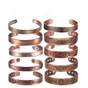 Collection of ten antique copper magnetic therapy bracelets with Celtic knot relief patterns