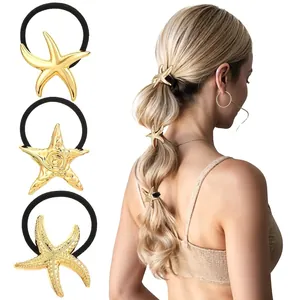Set of golden starfish hair ties with three unique textures on elastic black bands