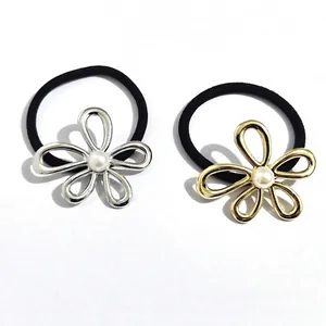 Elegant gold and silver flower hair ties with pearls on high elastic black rubber bands