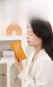 Detail of yellow PU leather sunglasses pouch showing high-quality odorless material