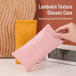 Portable pink and yellow PU leather sunglasses pouches with velvet lining and auto closure