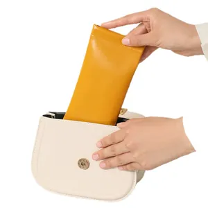 Bright yellow leather sunglasses pouch with automatic closure for portable eyewear storage