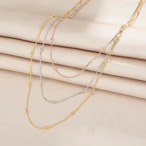 Ensemble de colliers à perles minimalistes en finitions or, argent et or rose