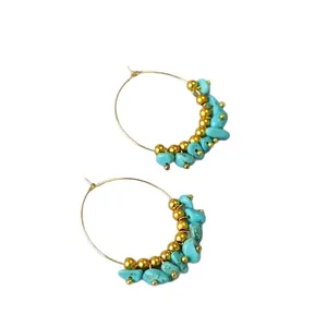 Retro hoop earrings featuring irregular turquoise beads and gold metal accents for women