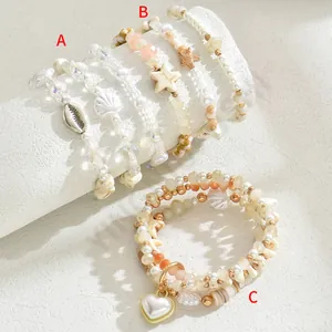 Bohemian Mehrlagige Perlenarmbänder Für Damen Legierung Muschel Seestern Herz Anhänger Imitationsperlen Glasperlen Elastischer Strand Schmuck