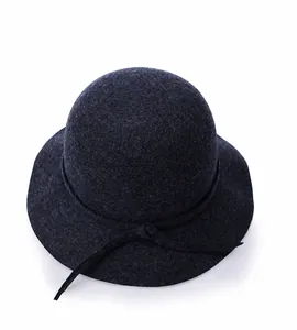 Top-down view of wool felt cloche hat with round crown and matching ribbon detail