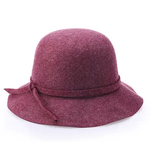 Elegant wine red wool cloche hat for women featuring a round top and delicate bow detail