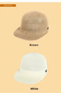 Detail of woven straw equestrian hats in brown and white with metallic M decoration