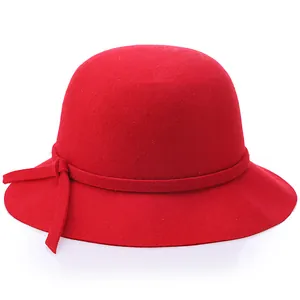 Elegant red wool cloche hat for women with minimalist bow detail on white background