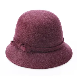 Elegant wine red wool felt cloche hat for women with bow detail on white background