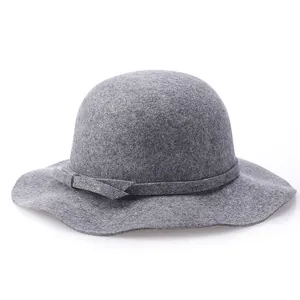 Elegant dark grey wool cloche hat with wavy brim and minimalist ribbon bow detail