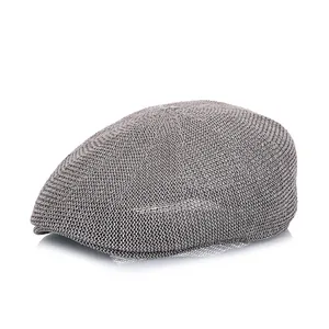 Detailed view of gray knit ivy cap featuring breathable mesh and textured fabric