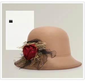 Elegant camel wool felt cloche hat with a 3D red satin rose and delicate black lace detail