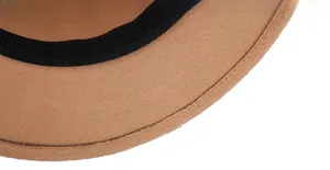 Detail of wool felt fedora hat showing fine stitching and black internal sweatband