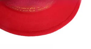 Macro detail of the red wool fedora hat showing precise stitching and inner ribbon