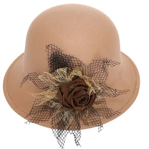 Elegant women's wool felt cloche hat in camel with dark brown floral mesh veil detail