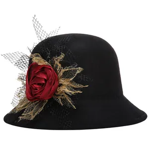 Elegant black wool felt cloche hat for women with red fabric rose and gold mesh veil