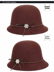 Front and side view of cloche hat with black ribbon bow and sparkling rhinestone floral accent