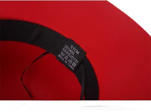 Detail view of red wool fedora inner lining with sweatband and wash care label