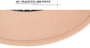 Detail of light camel wool felt hat showing high-quality stitching and fine texture