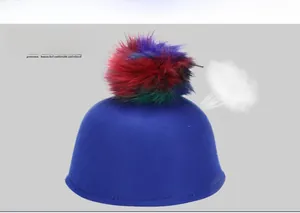 Detail view of navy wool felt hat with colorful pom-pom showing breathable fabric texture