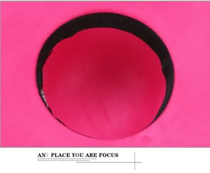 Detail showing the internal structure of the rose red felt hat with black inner sweatband
