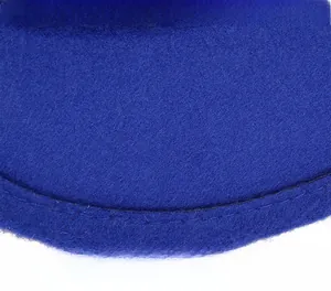 Detailed macro view of royal blue felt fabric with precise stitching and fine texture