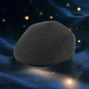 Detailed view of winter flat cap for elderly men with thick textured fabric and warm earflaps