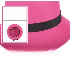 Detailed texture of rose pink wool felt fedora with black ribbon band and interior view