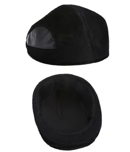 Detailed view of winter flat cap with warm fur lining and crocodile pattern leather trim