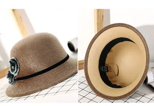Detail view of brown faux fur cloche hat showing plush texture and inner sweatband