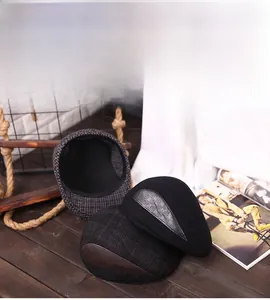 Detail view of vintage wool blend flat caps for elderly men in three plaid patterns