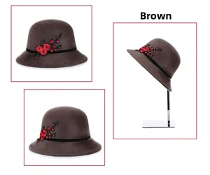 Detail of winter brown faux mink fur hat featuring elegant red plum blossom embroidery