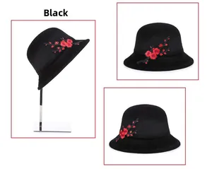 Detailed views of black faux mink fur winter hat with red plum blossom embroidery
