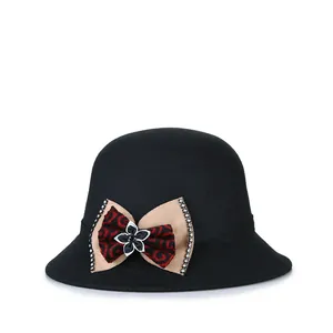 Elegante zwarte wollen cloche hoed voor dames met strass strik voor winterse warmte