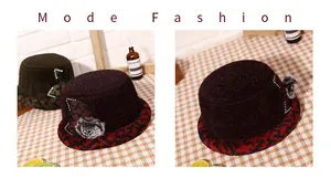 Macro view of women's warm winter hats featuring elegant sequins and faux fur ball details