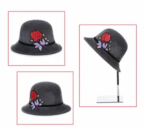 Detail view of grey wool cloche hat featuring elegant red rose embroidery and rhinestones