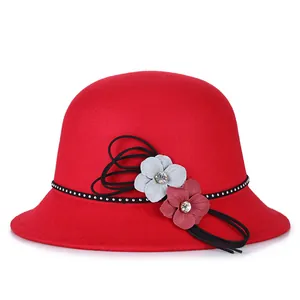 Elegant red wool cloche hat for women with floral accents and sparkling rhinestones