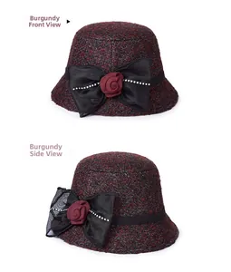 Detail view of wine red wool cloche hat with floral bow and elegant rhinestone accents