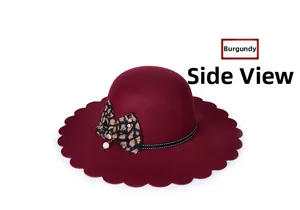 Side view of wine red wool fedora hat featuring wavy brim and leopard bow with pearl detail