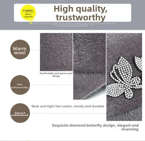 Detailed view of grey wool newsboy cap featuring crystal butterfly and neat stitching