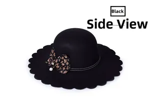 Side view of black wide-brim felt hat with scalloped edge, leopard bow and pearl charm