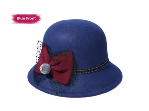 Close-up of blue wool felt cloche hat with burgundy bow and black polka dot mesh veil