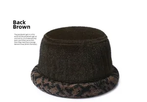 Detail view of the brown winter hat back showing thick faux fur texture and woven patterns
