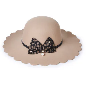 Elegant camel wool felt fedora for women with wavy brim and leopard bow detail