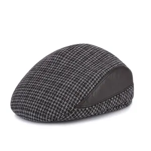 Classic houndstooth flat cap for men with premium dark brown leather side panels