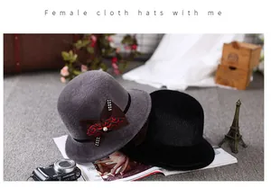 Close-up of elegant wool felt hats featuring rhinestone bows and vintage styling