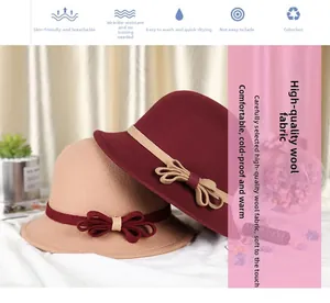Close-up of khaki and wine red wool cloche hats with decorative bow tie details
