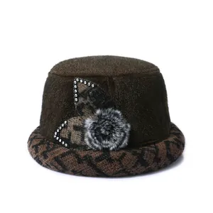 Winter warm faux fur hat for elderly women with rhinestones and flower decoration