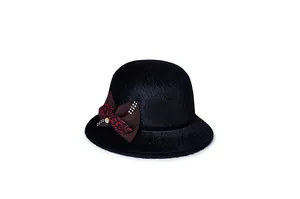 Detailed texture of black wool cloche hat with rhinestone leopard print bow decoration